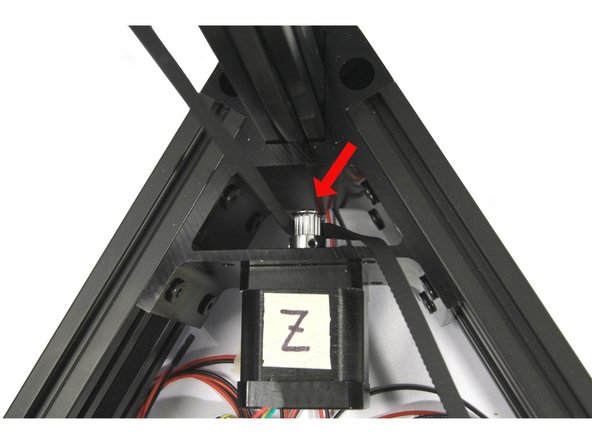 Pass the belt down to the stepper motor making sure not to twist it.