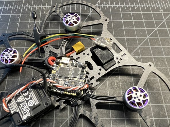 Insert RX mount in opening as shown. (pic #1) NOTE:  IT SHOULD BE ROTATED 180 DEGREES NOT SHOWN CORRECTLY