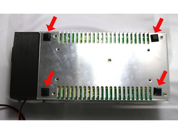 Retrieve the square of four feet from the Feet &amp; Hardware bag.