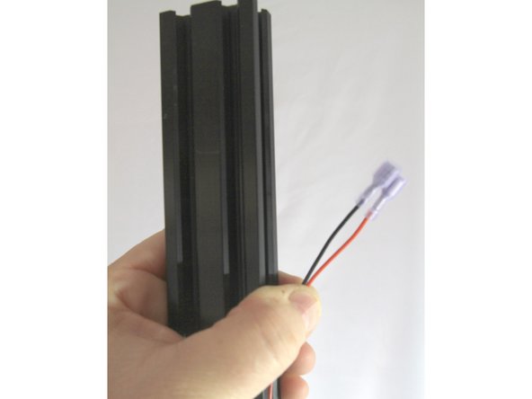 Pull the endstop wires out of the bottom of the tower extrusion until the other end (white connectors) are about 40mm (1.5&quot;) shorter than the tower length as shown in the photo.