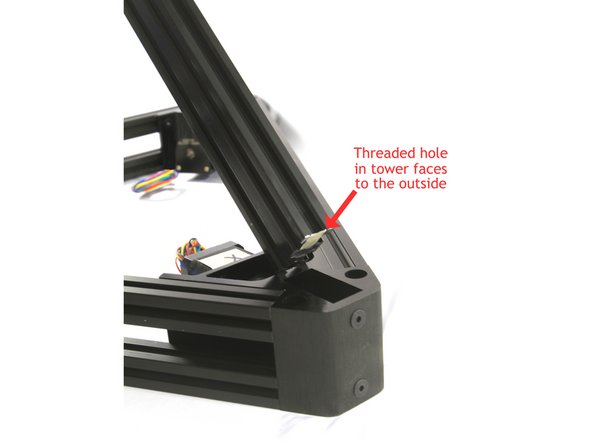 Positon the base with the X, Y,  Z labels facing up on a flat surface.