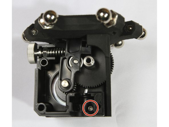 Insert the M3 grub/set screw in the steel pinion gear and slide it on the stepper motor shaft with the screw facing closest to the stepper. This is described in detail in the E3D guide.