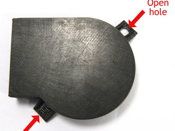 Clear the two attachment holes in the printed Fan Shroud with an X-acto knife or 5mm drill.