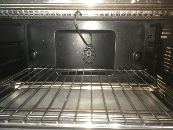 Remove the grounding clip from the part hook