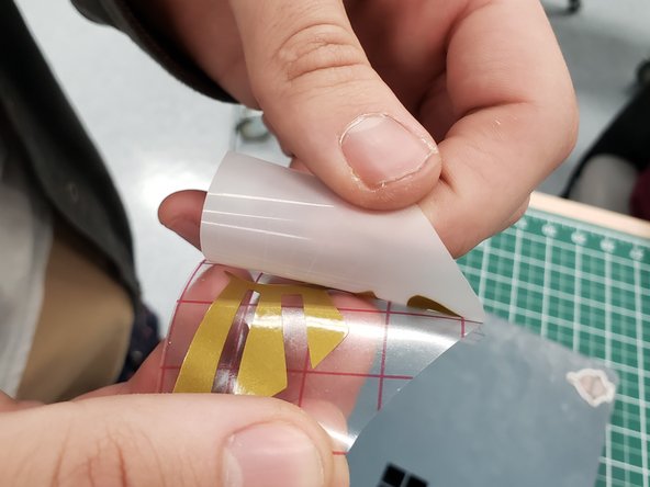 When ready to apply the vinyl sticker, remove the sticker backing attached to the vinyl SLOWLY