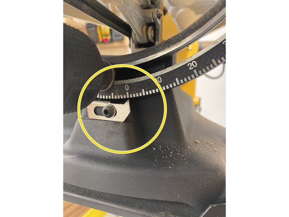 To angle, turn the black knob counterclockwise to release the tension hold. Then move the table to the desired angle.