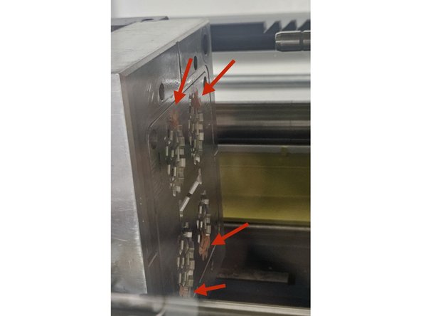 Issue: Part material remains adhered to the mold or becomes lodged between the ejector pins after ejection. Images 1 and 2 feature areas where stuck plastic is commonly found and should be inspected for adhered material.