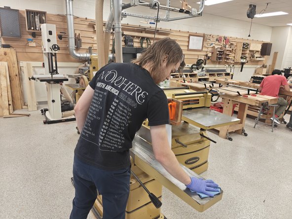 Spray a healthy amount of Isopropyl onto the bed and wipe it off with either a shop towel, or a white rag