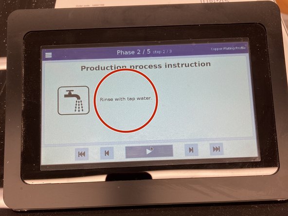Once phase 1 is complete, remove the board from bath 1 and rinse it with tap water