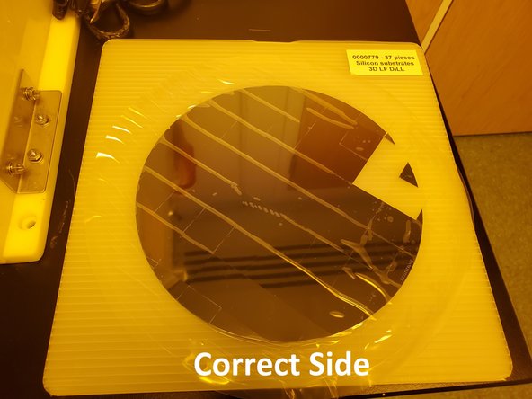 Use the polished side of the substrate as the print surface, which is the side you put the photoresist on.
