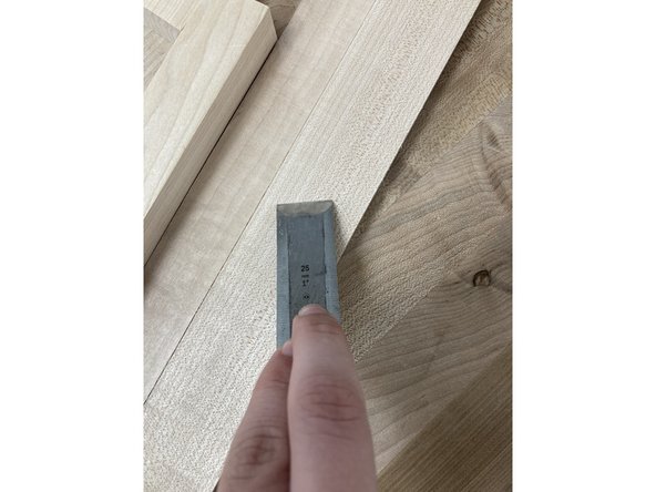 For applications where you don't need a mallet and you need more precision, usually paring cuts, hold the back of the chisel as pictured.