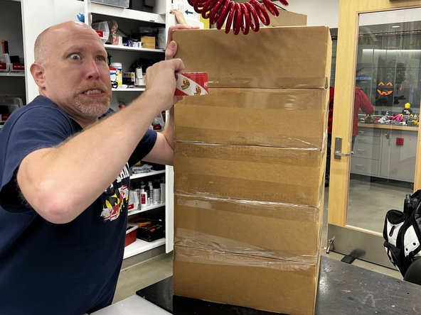 As described on the Stratasys Recycling page, bundle the canister boxes together with packing tape