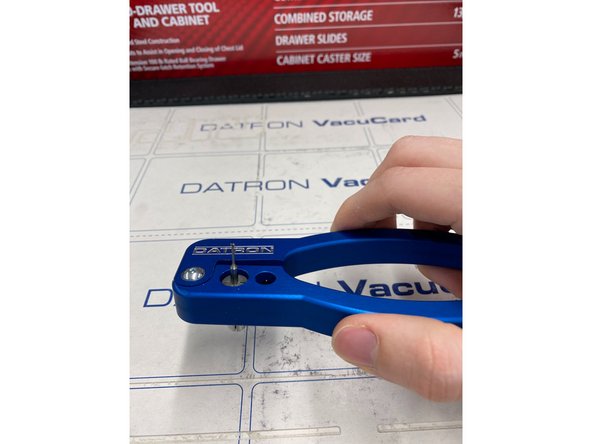 After removing the old tool, simply slip the new tool in the collet whilst still holding on the clamp.