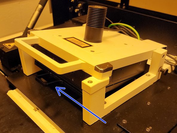 Ensure that the &quot;Exchange Sample Holder&quot; window is open on NanoWrite and open the top hatch.