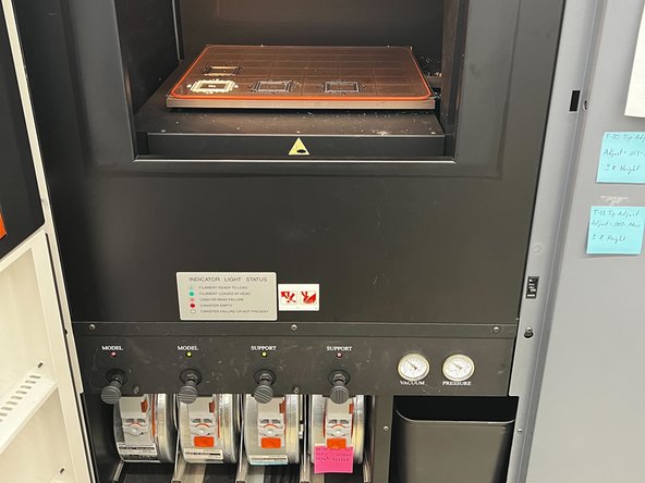 Place the appropriate build sheet on the platen and wait for a vacuum to be achieved. The vacuum gauge should read -15 inHg or greater (more negative)