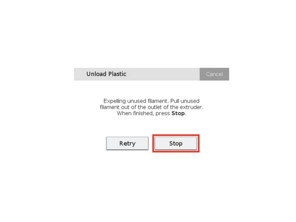 Take hold of the cut plastic material and help direct it free from the plastic extruder