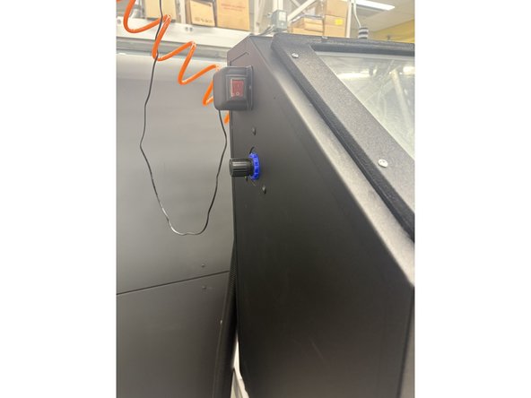 Step 4: Look at the outside of the sandblaster. Take notice of the latches to open the door. The pressure gauge, which tracks the psi of the static nozzle. Also the knob on the left side of the machine to adjust pressure.