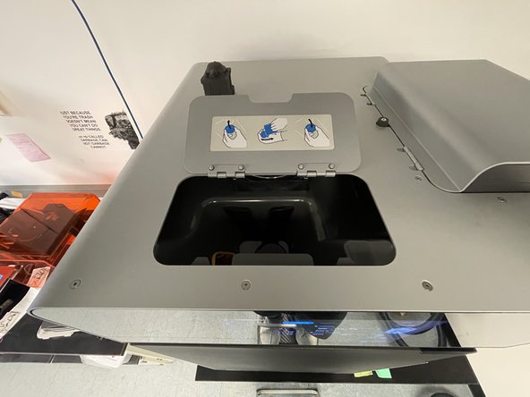 Use a step-stool to access the door on the top of Fuse directly above the touch screen.