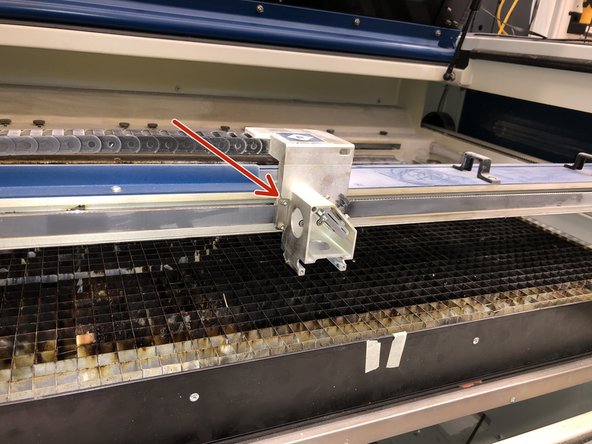 Gently move the gantry to a easy to reach position