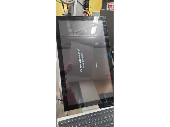 Wait to continue turning off the machine until you see the following screen.