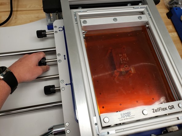 Use the knobs on the left side to precisely align the PCB to the stencil.