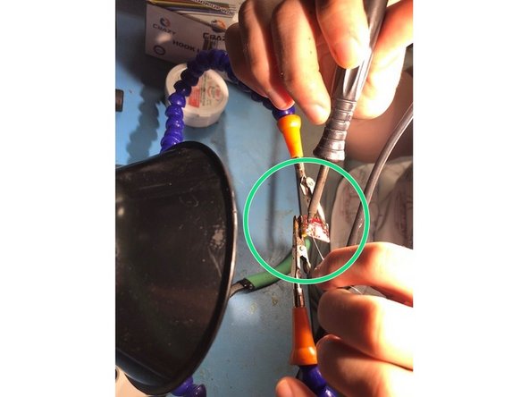 Move the wire all around each socket to ensure the pins are completely soldered onto the LED