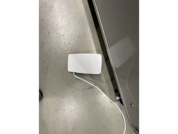 Slowly press on the pedal to start winding