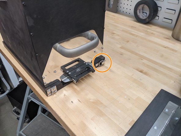 When prompted, open the printer door and install the build box gasket around the build plate