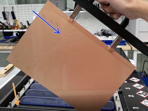 Insert the long side into the clamps and tighten with an Allen wrench