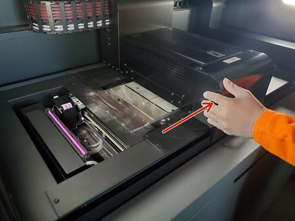Throughout this process, the printhead can manually be moved (slowly) back and forth to gain better access to both sides of the carriage