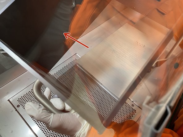 Slowly lift the build box up and aside