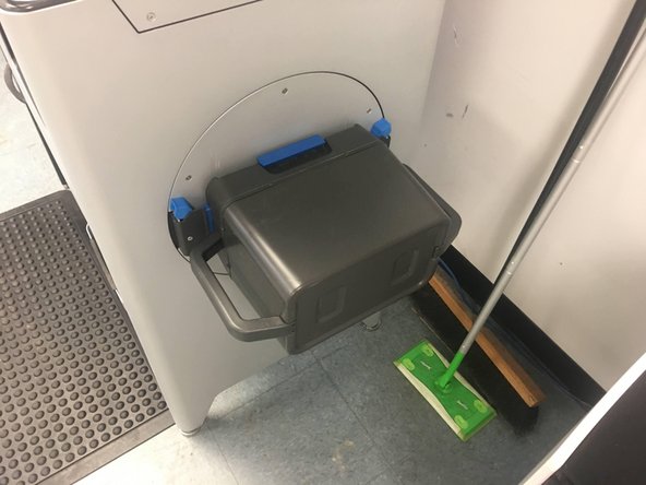 Lift the Powder Bin with both hands, and carefully slot the bin into the &quot;mixer&quot; such that the top of the Powder Bin is against the body of the sift