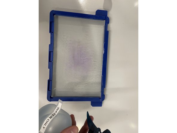 To clean the build plate apply a large amount of water and wipe clean with a paper towel to remove excess glue