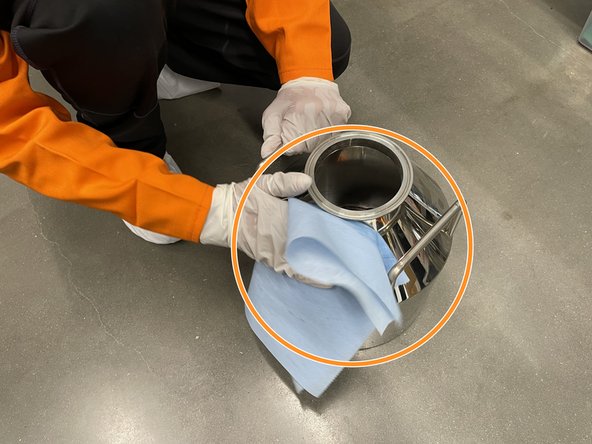 Slowly pour the metal powder into the hopper