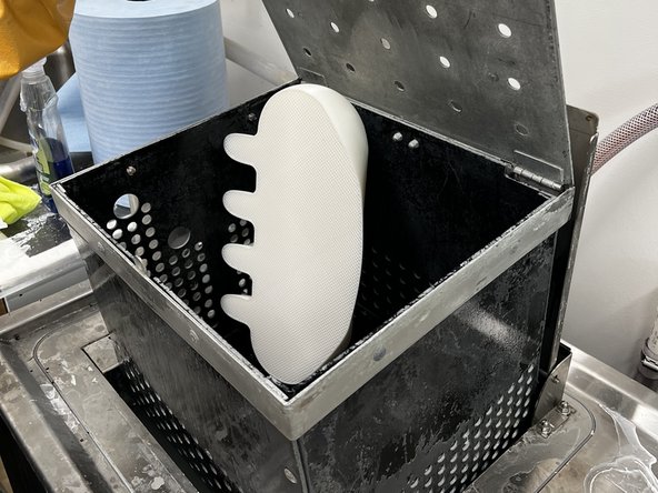 With the basket lid latched and the tank lid in the locked upright position, you can lift the basket up and hang it from the tank lid for easier part removal