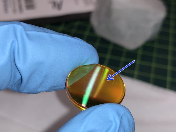 If there are any cracks or burn marks on the lens that do not clean off, it's time to replace the lens. Please ask a lab coordinator for assistance.