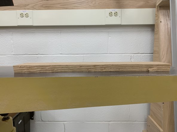 Lay the board on a flat surface and check each edge and face for flatness.