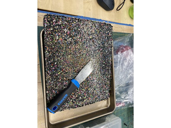 Wait around 20 minutes for it to cool, and then remove the PLA sheet from the baking tray.