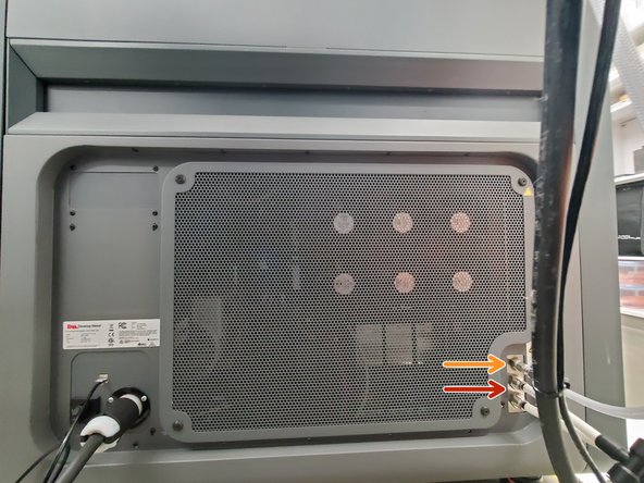 There are two exhaust pipes which come out of the back of the furnace