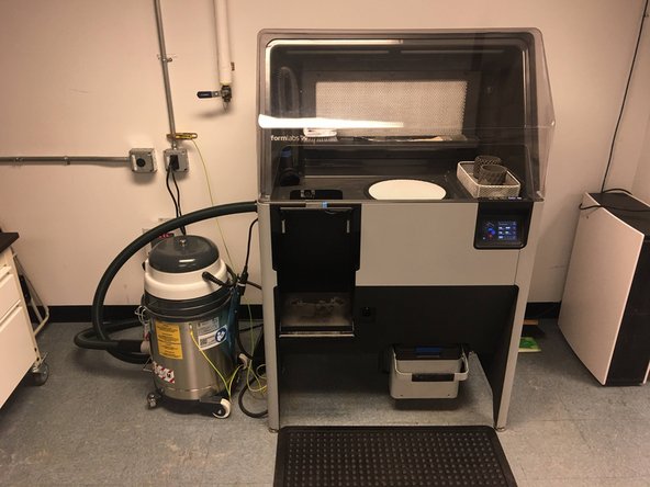 Post Process your part using the Sift and Bead Blaster