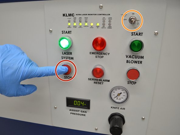 Press stop on the left side to turn the machine off