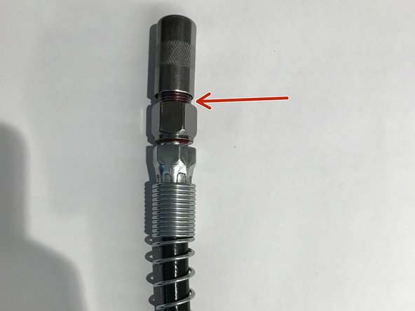 Make sure everything on the nozzle is tightened as shown. No threads are visible.