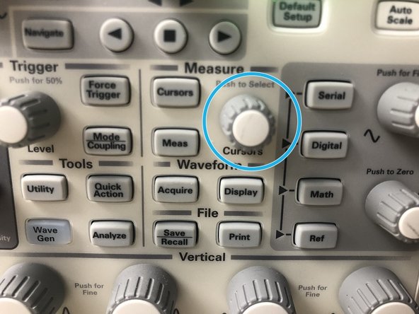 The Measure knob (next to the Cursors button) will move the cursor currently selected (left/right if it's an X axis cursor, up/down if it's in the Y axis).