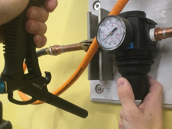 Lower the pressure of the air hose to 8 PSI