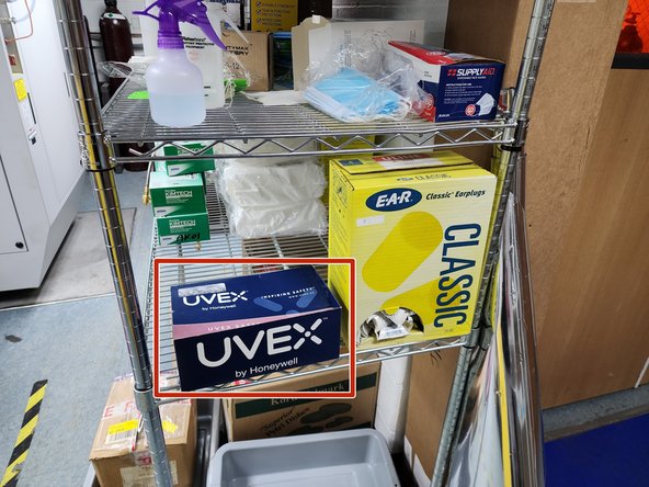 Gloves should be donned before entering the room.