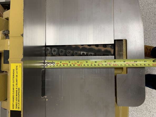 Use both hands to push or pull fence to desired distance