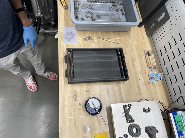 Carefully set in a graphite base plate: