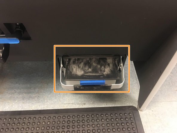 Use the blue handle to open the powder bin completely, but leave the bin drawer completely pushed in under the sift