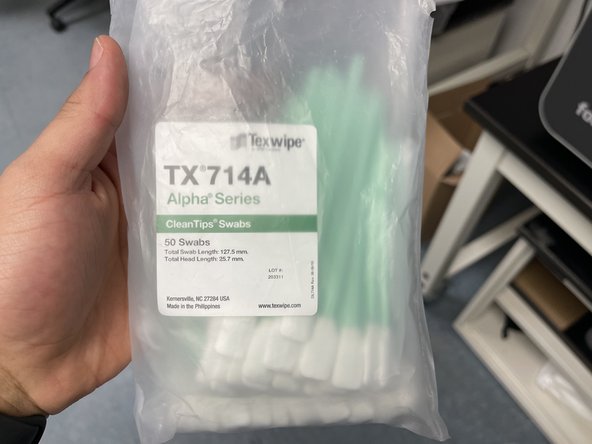 Push down on the prong on top of the yellow cable to remove it from the IR sensor and set aside.