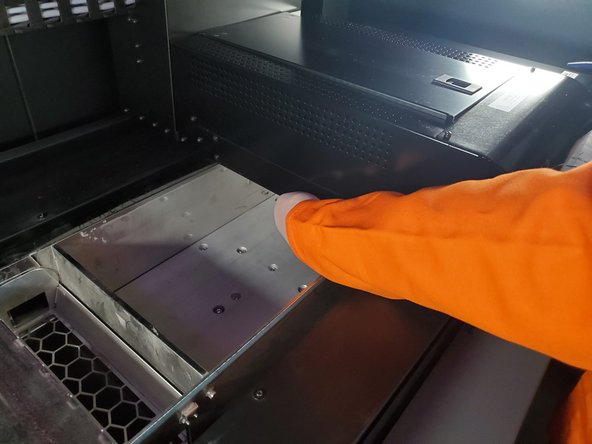 Push the printhead carriage further to the right, gently